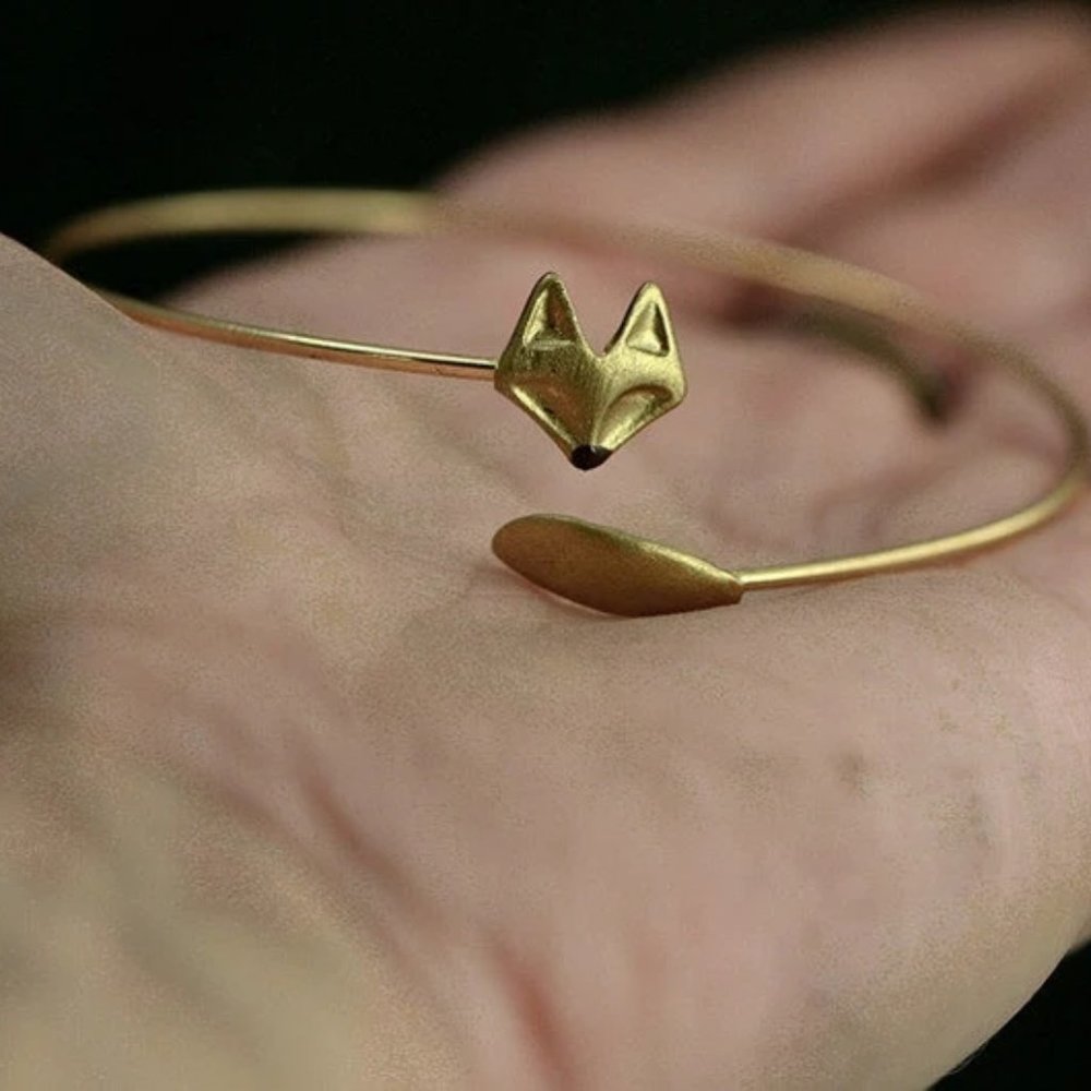 Delicate hand gilded fox bangle. Fox and tail, hand gilded and enameled. Adjusta